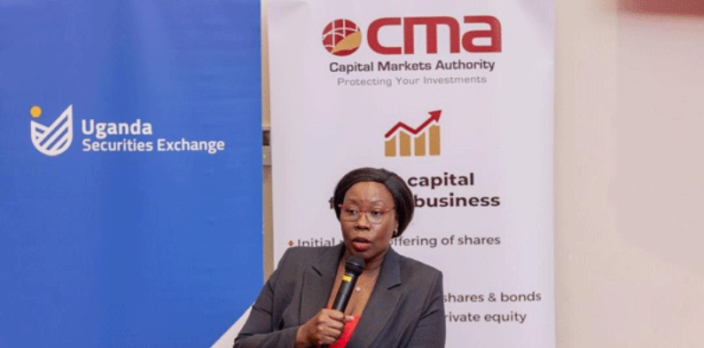File:Ms Josephine Okui Ossiya, the CMA chief executive officer, speaks at a past event. CMA now has powers to remove a chief executive of a regulated company who may be deemed unfit to run an entity..png